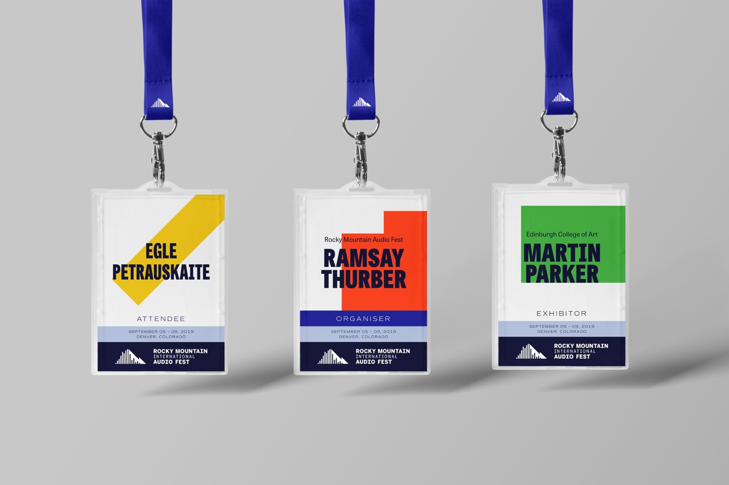 Three exhibitor lanyards each featuring a different name "Egle Petrauskaite", "Ramsay Thurber" and "Martin Parker"