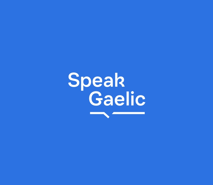 “SpeakGaelic” white text sits on a broken white line. The words are in two steps