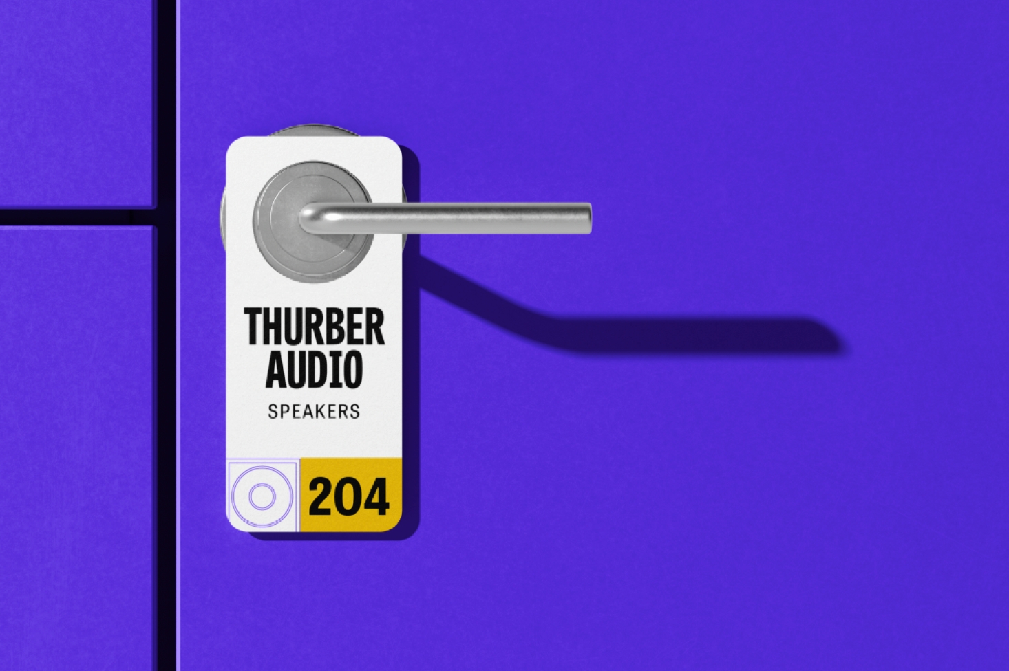 A door-hanger sign states "Thurber Audio speakers" and the number 204"