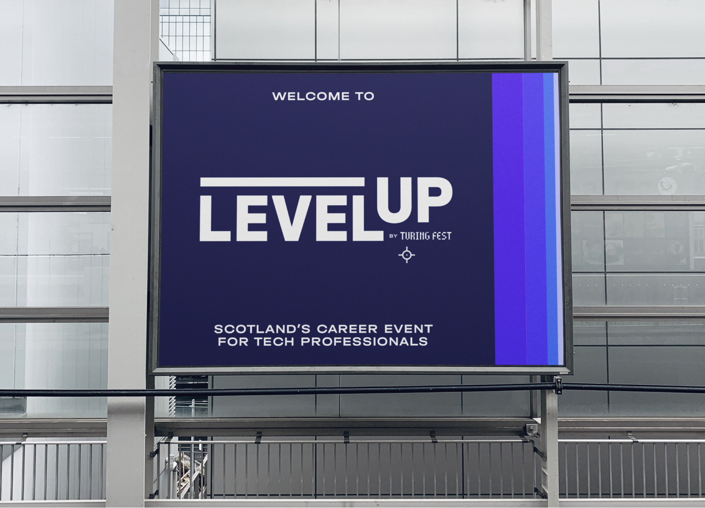 A picture of a sign saying “Welcome to Level Up By Turing Fest Scotland's Career Event For Tech Professionals”, over a background of vertical stripes in different shades of blue