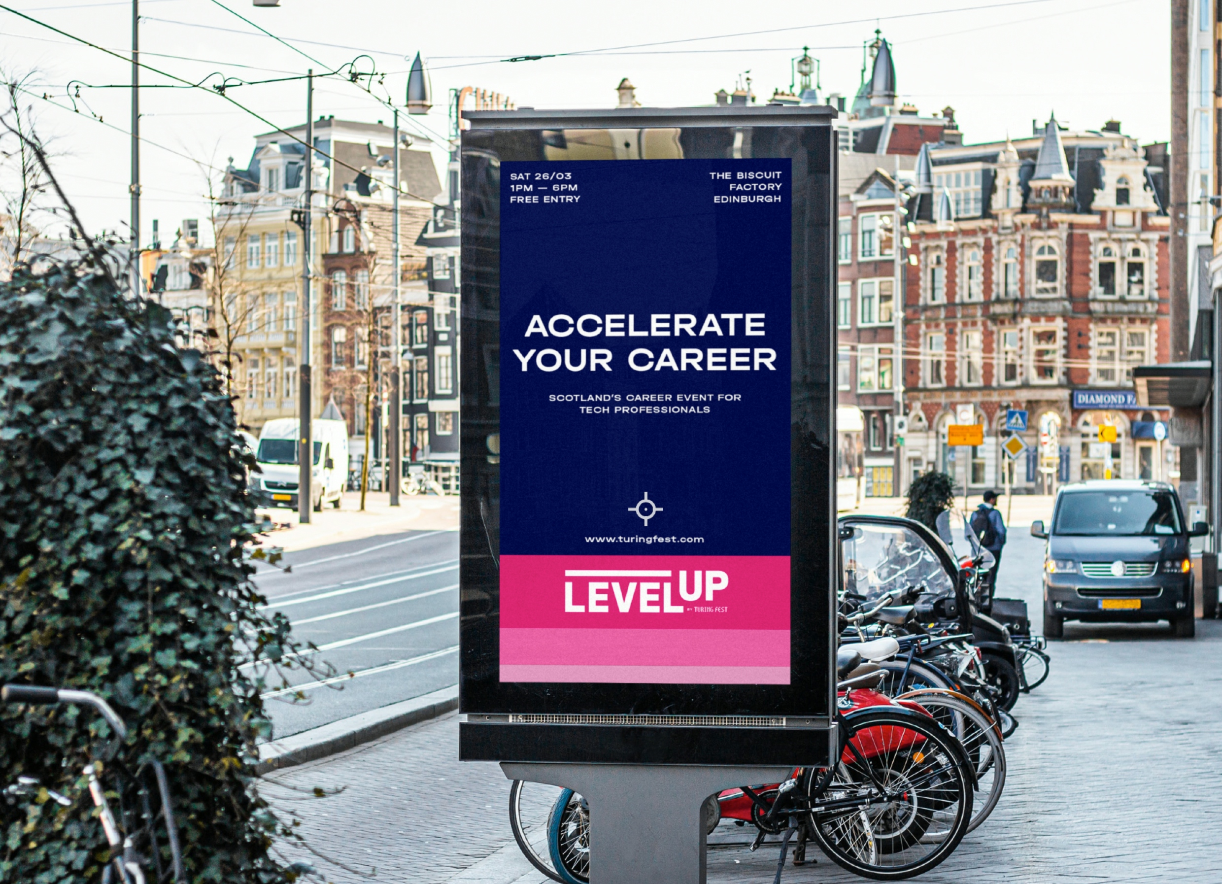A digital street poster with an advert for the event. Text includes “Accelerate Your Career”, “Scotland’s Career Event For Tech Professionals”, “LEVEL UP”, and event details.