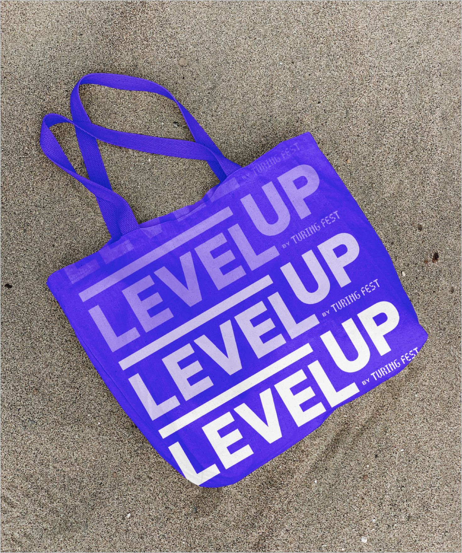 An example of promotional swag; a blue ‘Level Up’ canvas bag