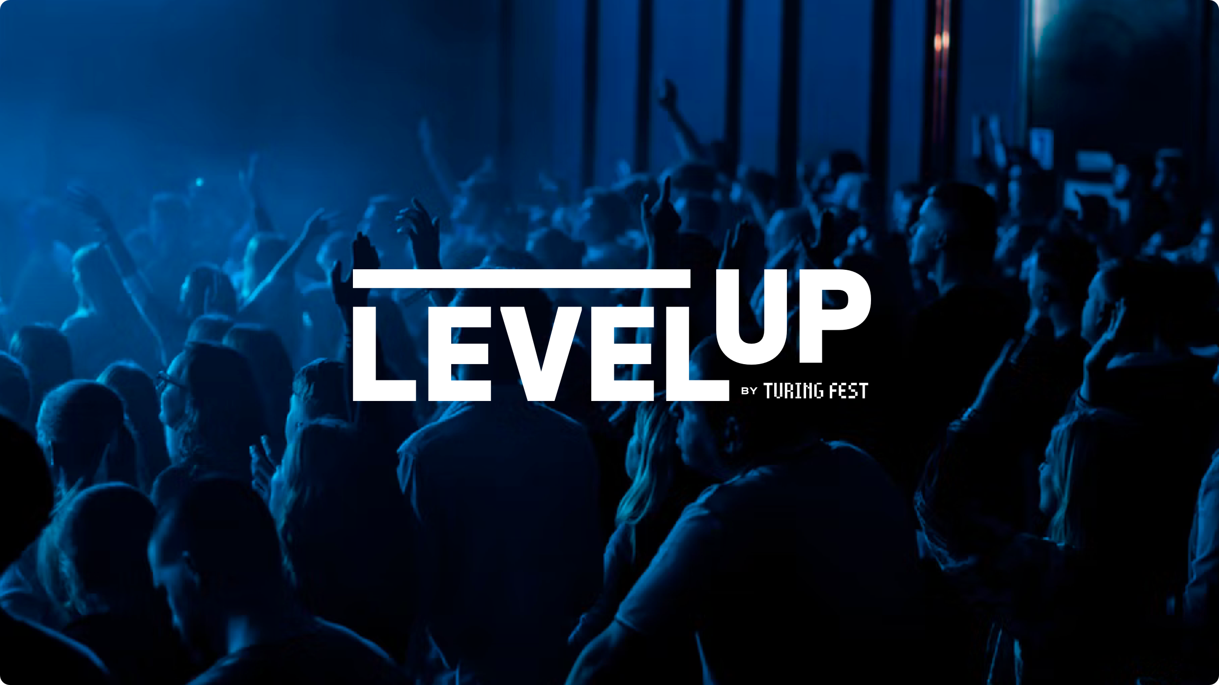 A concert crowd shot with blue lighting, overlaid with the “Level Up By Turing Fest” logo